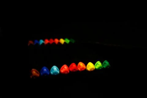 Inline neon multicolor fineliners isolated on black Stock Photos