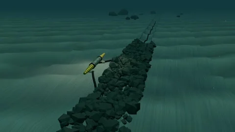 Inline repair joint and bend restrictors resting on the seabed 스톡 동영상 344542038