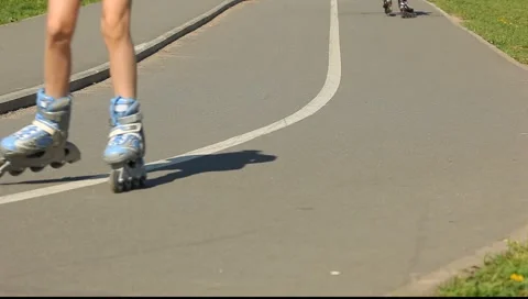 Inline skater legs on the road slope Stock Footage 5496561