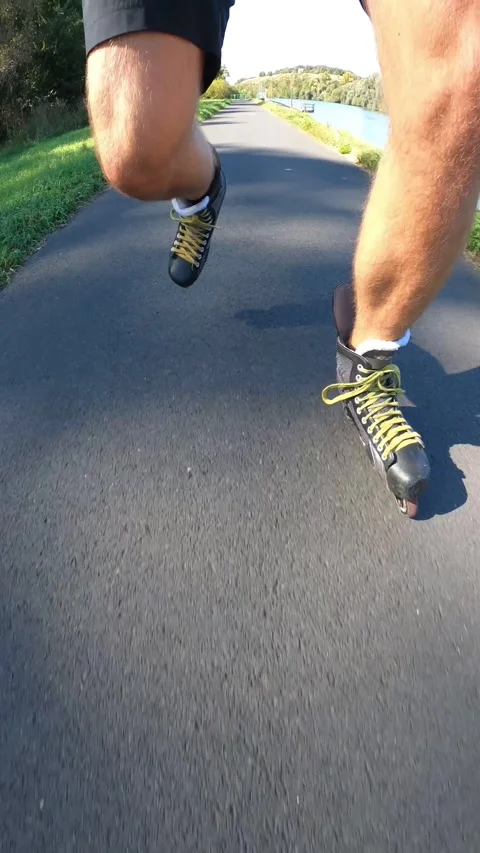 Inline skating, a front view of skating in vertical video Stock Footage 270529528