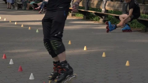 InLine Skating Trick Skater Spins and Twirls Stock Footage 245996374