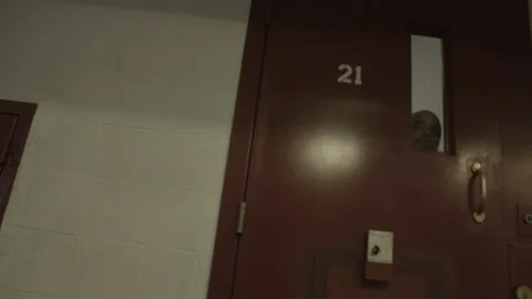 Inmate Looking out Jail Cell Window Stock Footage 88441361