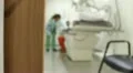 inmate or prisoner being xrayed deputy soft focus Video HD