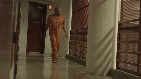 Inmate Walking on Corridor 1 Stock Footage 87754864