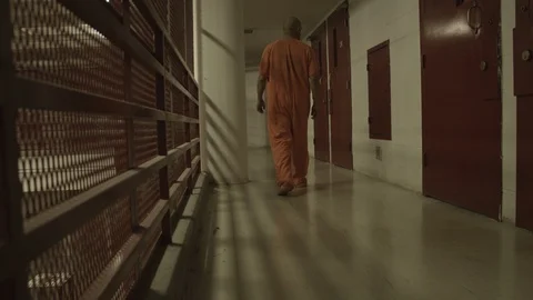 Inmate Walking on Corridor 2 Stock Footage 88411439