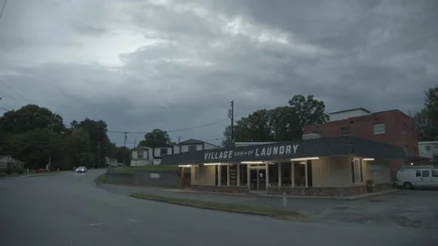Inner City Laundromat at dusk Stock Footage 140436121