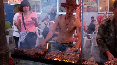 An Inner Mongolian man crying his roast mutton for sale Stock Footage 40391244