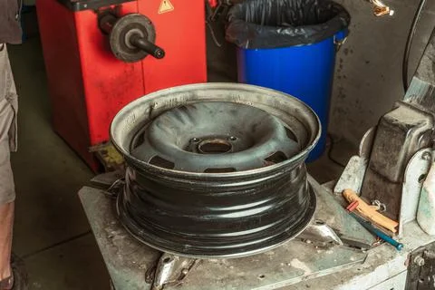 Inner part of a car tyre on a table in a garage Stock Photos