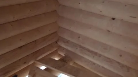 Inner part of the structure of the wooden house, details of the wooden structure Stock Footage 239201054
