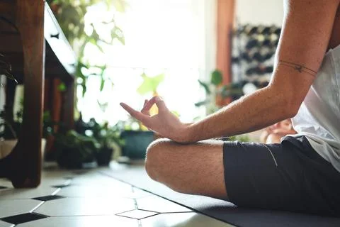 Inner work is just as important as outer work. an unrecognisable man meditating Foto stock
