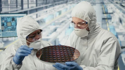 Innovating components, silicon wafers and team of technicians Stock Footage 333382625