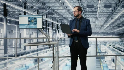 Innovating engineering process, microchips and man in production plant Stock Footage 333379435