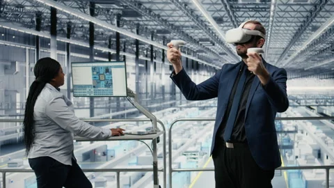 Innovating microchip production, VR goggles gear and man with coworker Stock Footage 333381926