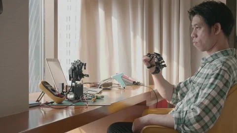 Innovating Technology: A Young Engineer at Work Stock Footage 319415144