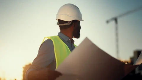 Innovation and modern technology in construction, portrait of African engineer Stock Footage 317806424