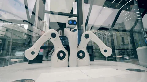 Innovation, modern technology concept. High-tech droid is moving its arms in a Stock Footage 138790536