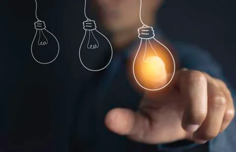 Innovation or creative concept of hand hold a light bulb and copy space for i Stock Photos