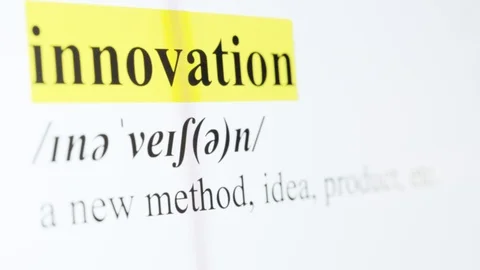 Innovation Text Macro Shot Highlighted in Yellow Color On Computer Screen Stock Footage 123224322
