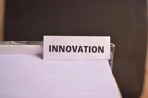 Innovation Text on Paper Tab Inserted in Book for Creative Thinking and Mod.. Stock Photos