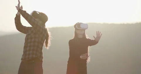 Innovation VR technology concept, two people in virtual reality box glasses Stock Footage 310381250