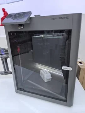 Innovative 3D printer showcasing intricate design and modern technology Stock Photos