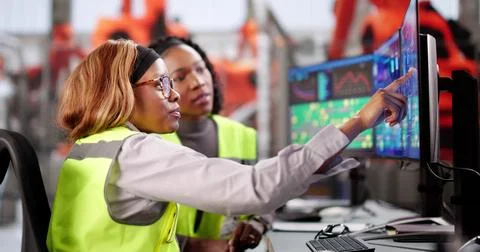 Innovative African American Engineer Utilizing Computer Stock Photos