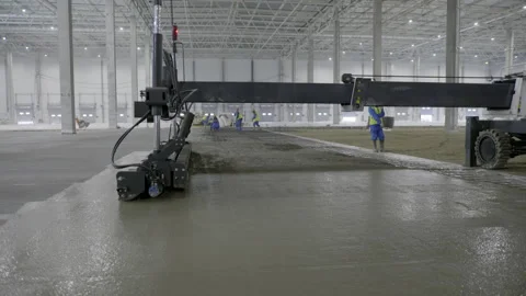 Innovative Automated Concrete Pouring Implementation in an Industrial Stock Footage 296778903