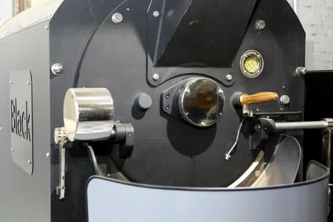 Innovative coffee roaster. Coffee export production for the consumer market. Stock Photos