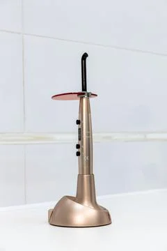Innovative Dental Curing Light Designed for Efficient and Precise Polymerization Stock Photos