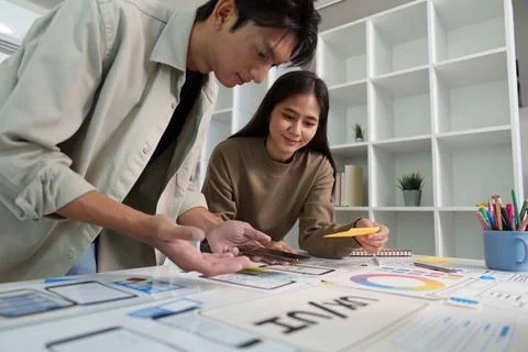 Innovative Design Session. Team brainstorming on digital mockups and color Stock Photos