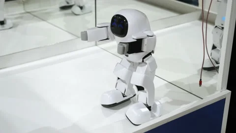 Innovative electronic robot is moving, dancing. White small futuristic robot Stock Footage 166745814