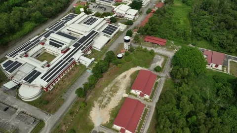 Innovative energy solutions at a modern facility with solar panels Stock Footage 311986804