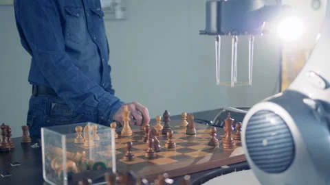 Innovative gaming emulator, robot playing chess with a human. Futuristic robotic Video stock 86055083