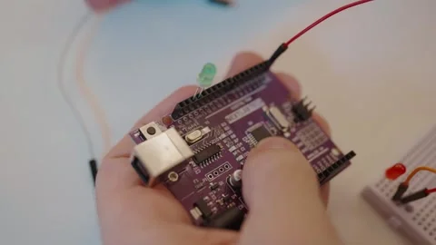 Innovative Hands-On with Microcontroller in Circuit Building Stock Footage 322889246