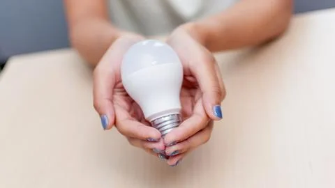 Innovative lighting solutions home environment product hands- showcase crea.. Stock Photos