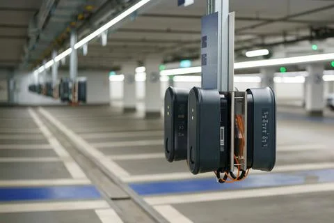 Innovative parking system equipment in an empty underground parking facilit.. Stock Photos