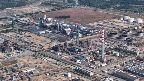 Innovative processes in a bustling oil refinery amidst expanding energy needs Stock Footage 334028406