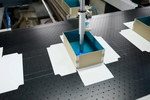 Innovative robotic process transforms cardboard box assembly in a state-of-the Stock Photos