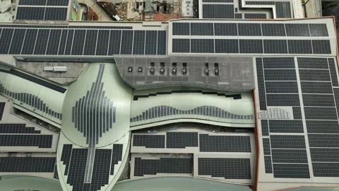 Innovative solar panel installation on rooftop in urban area Stock Footage 311987033