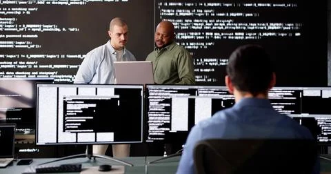 Innovative Team of Diverse Software Engineers Develop Computer 库存照片