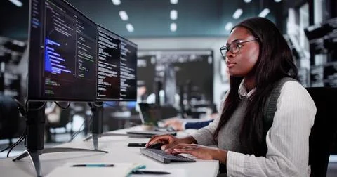 Innovative Tech Team Collaborating To Engineer Computer Solutions For Busines Stock Photos
