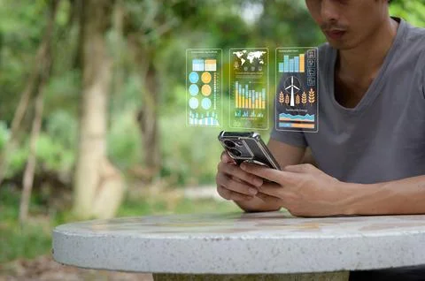 Innovative Technology Displaying Sustainability Data on Mobile Device Stock Photos