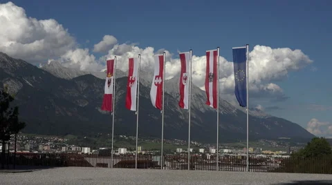 Innsbruck Austria flags over looking city mountain 4K 050 Vídeos de archivo 44302819