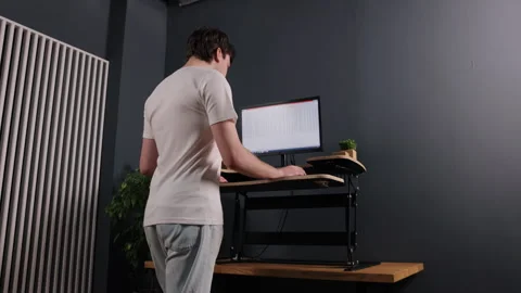 Inputting text, man typing, desk computer Stock-Footage 297184052