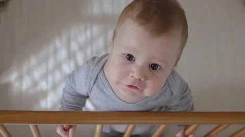 Inquisitive Baby Crib Stock Footage 292260610