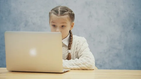 Inquisitive child got an idea what to search in the internet. Stock Footage 113072817