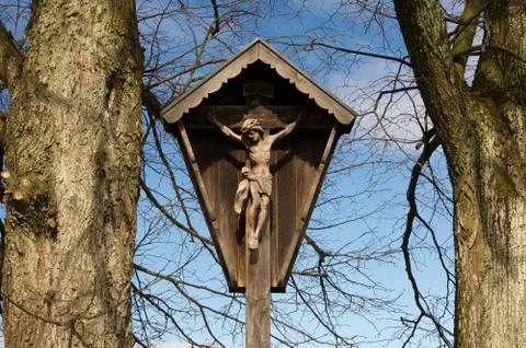 Inri cross beetween two trees Stockfoto's