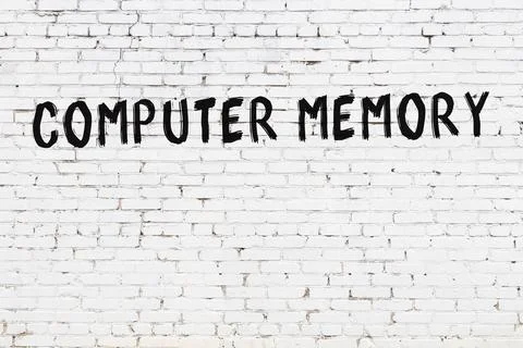  Inscription computer memory written with black paint on white brick wall. Illustrazione stock