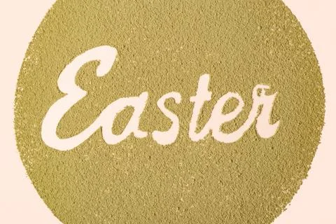 The inscription Easter in a round frame from matcha tea. Spring celebration Stock Photos