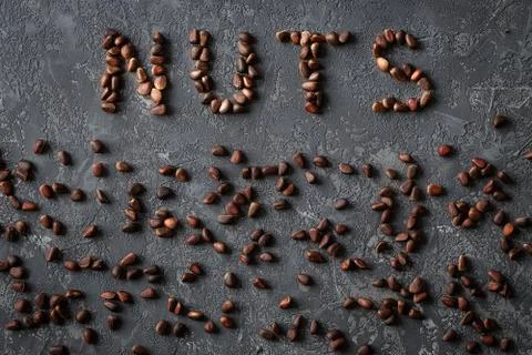 Inscription Nuts, from different nuts. space for text Foto stock
